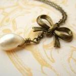Necklace With Brass Bow And Freshwater Pearl - A..